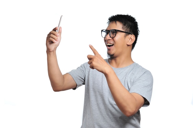 Portrait of happy asian person very excited when get the best price at online store