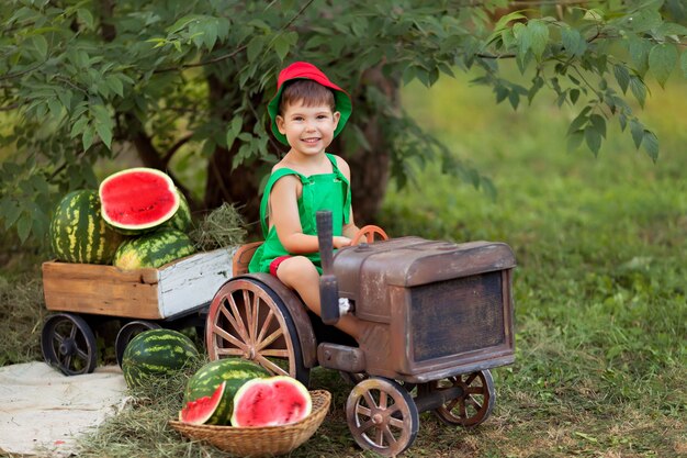 Portrait of a happy baby boy outdoors