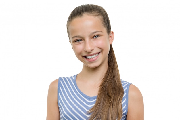 Portrait of happy beautiful young smiling girl