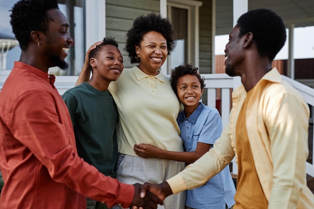 Photo portrait of happy black family gathering for summer party outdoors