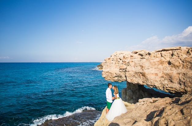 Portrait of happy bride and groom outdoor in nature location