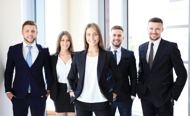 Portrait of happy business partners looking at camera