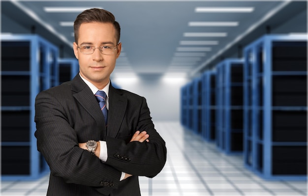 Portrait of happy businessman on background