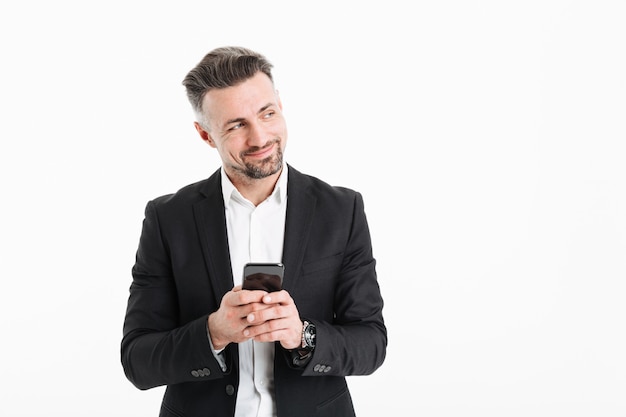 Portrait of a happy businessman dressed in suit