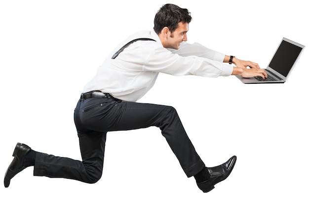 Portrait of happy businessman with laptop on background