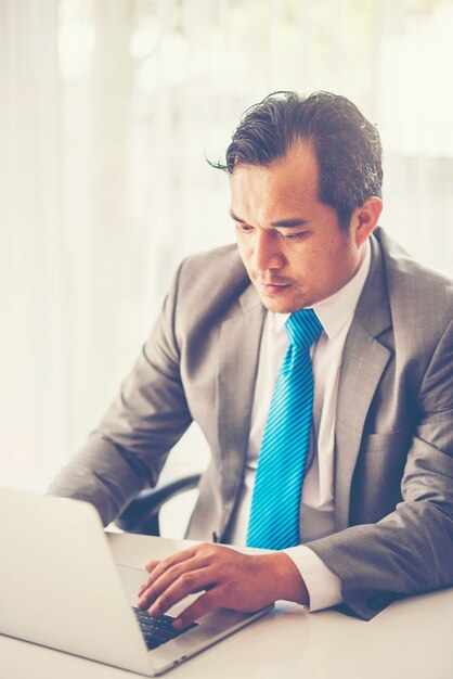 Portrait of happy businessman