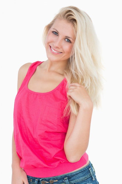 Portrait of happy casual young woman with blonde hair