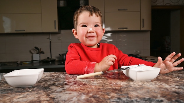 Portrait of a happy child in the kitchen