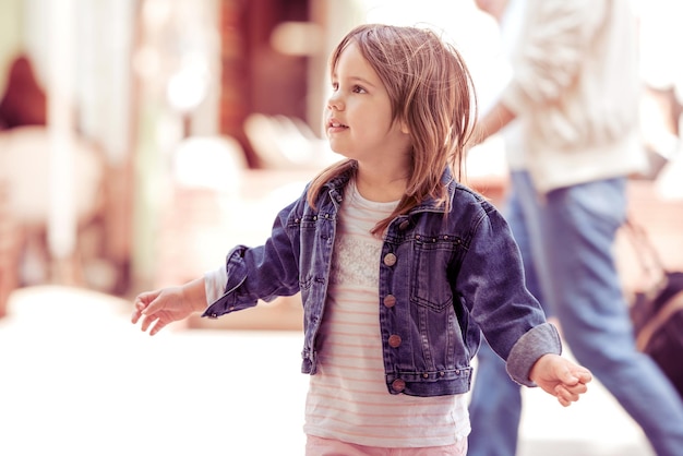 Portrait of happy child playing outdoors