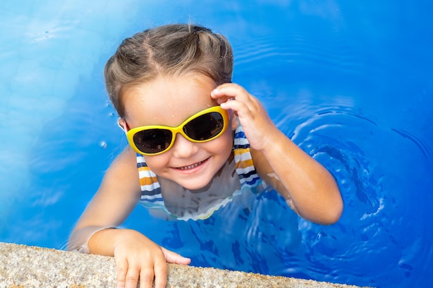 Portrait of happy child in the water