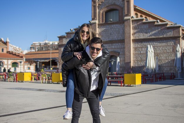 A portrait of a happy couple having fun outdoors