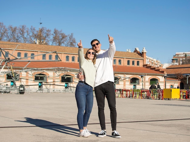 A portrait of a happy couple having fun outdoors