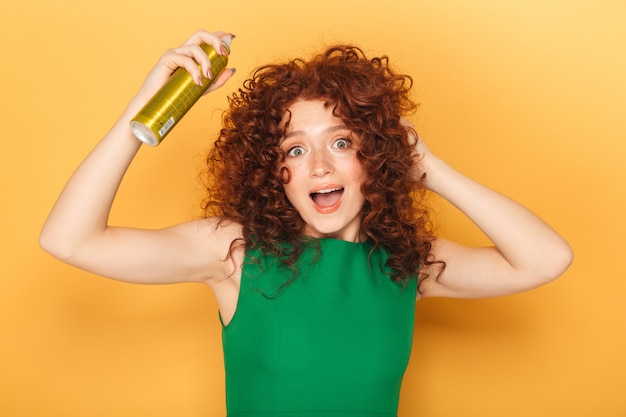 Portrait of a happy curly redhead woman