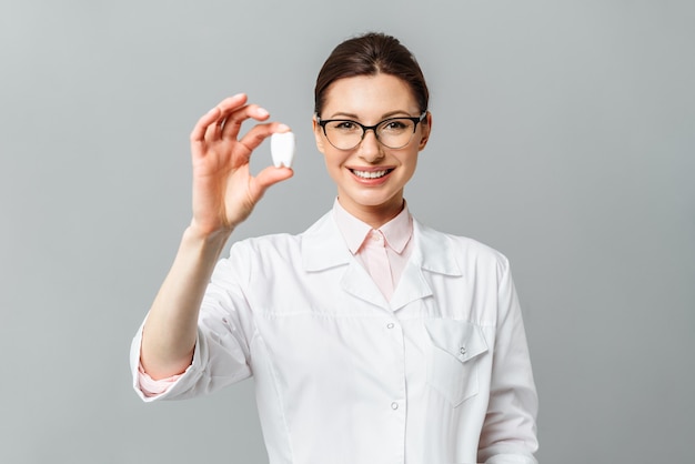 Portrait of a happy doctor dentist beautiful female smile dentistry concept