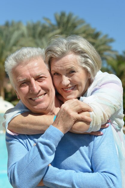 Portrait of a happy elderly couple embracing