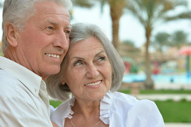 Portrait of a happy elderly couple embracing