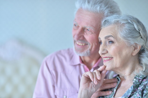 Portrait of a happy elderly couple embracing