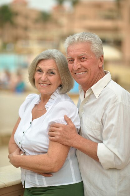 Portrait of a happy elderly couple embracing