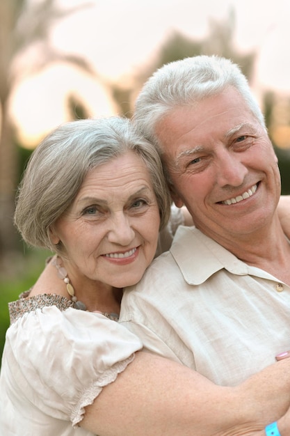 portrait of a happy elderly couple embracing