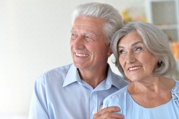 Portrait of a happy elderly couple embracing