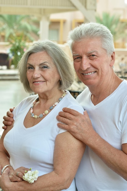 Portrait of a happy elderly couple embracing