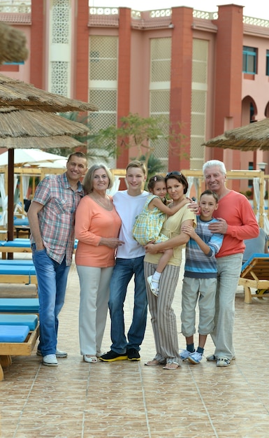 Portrait of a happy family relaxing at vacation resort
