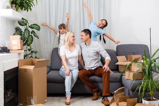 Portrait of a happy family smiling at home