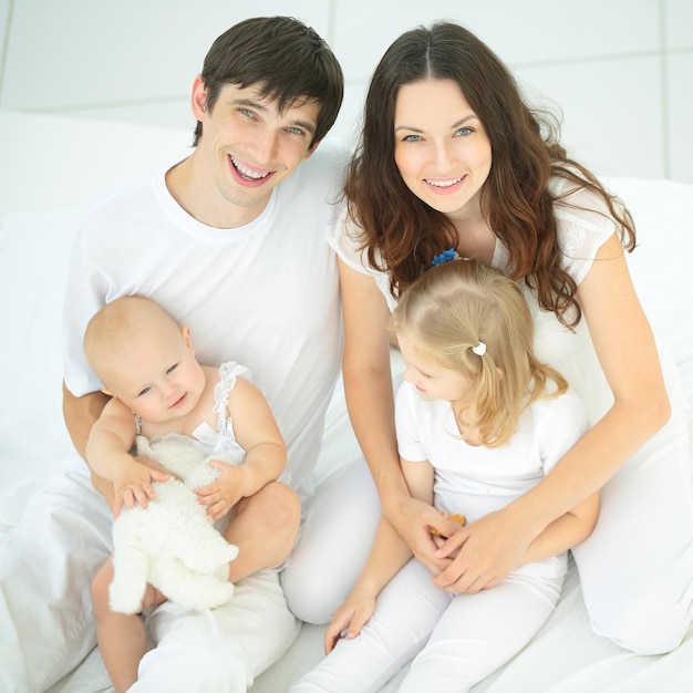 Portrait of a happy family on a white background