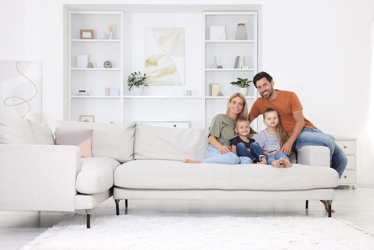 Photo portrait of happy family with children on sofa at home