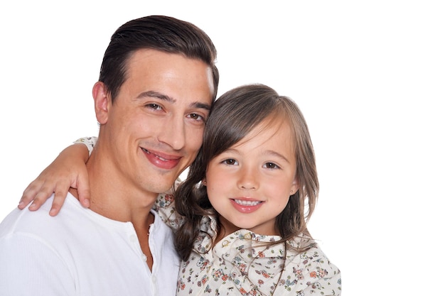 Portrait of happy father and daughter hugging