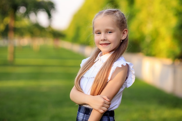 Portrait of a happy first grader schoolgirl