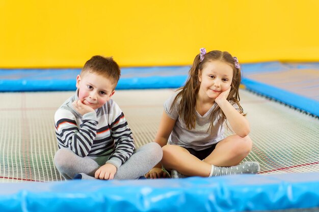 Portrait of happy friends in swimming pool