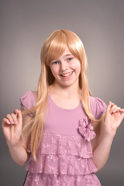 Portrait of a happy girl posing in studio