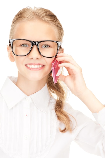 Portrait of happy girl with cell phone