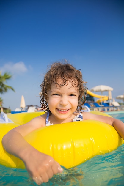 Portrait of happy kid posing outdoor