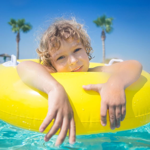 Portrait of happy kid posing outdoor