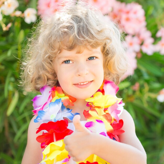 Portrait of happy kid posing outdoor