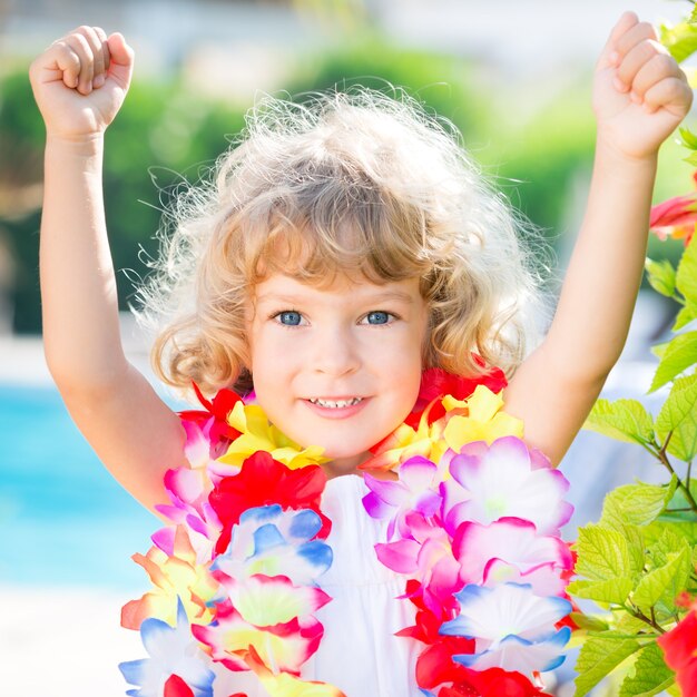 Portrait of happy kid posing outdoor