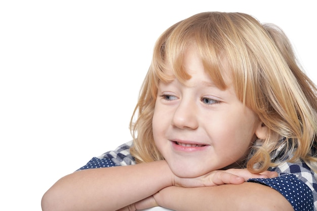 Portrait of happy little boy on white background