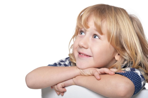 Portrait of happy little boy on white background