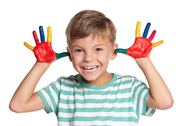 Portrait of happy little boy with paints on hands isolated on white background