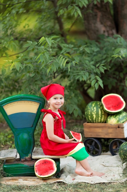 Portrait of a happy little girl outdoors