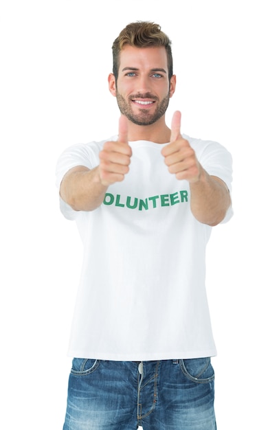 Portrait of a happy male volunteer gesturing thumbs up