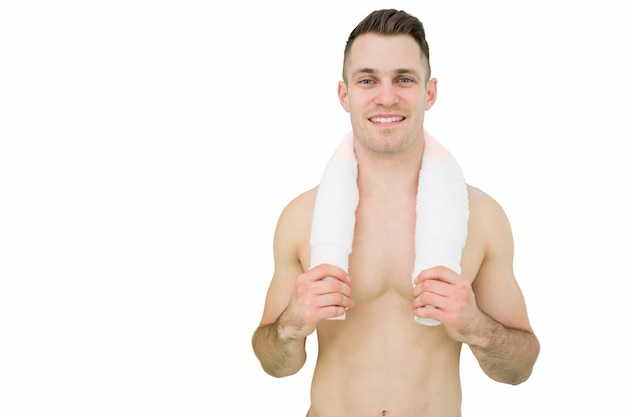 Portrait of happy man holding towel around neck