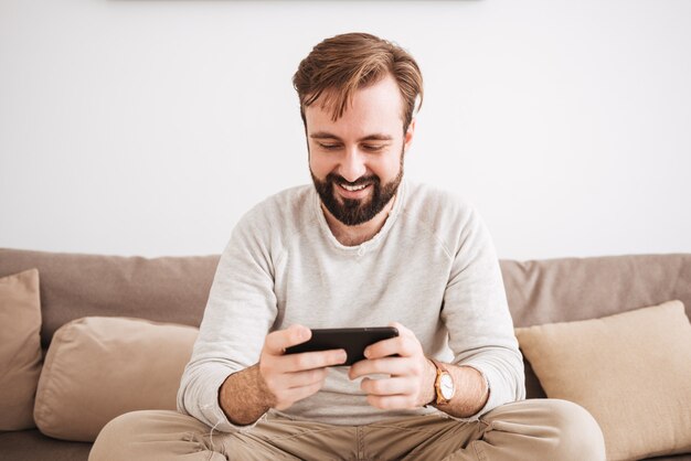 Portrait of a happy man playing games