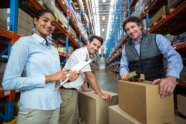 Portrait of happy managers are posing during work