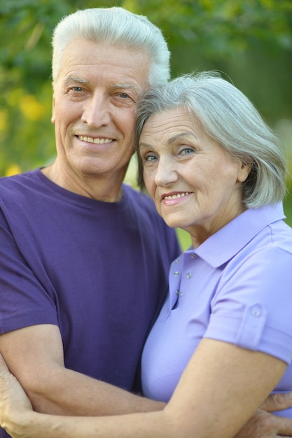 Portrait of a happy Mature couple in autumn park