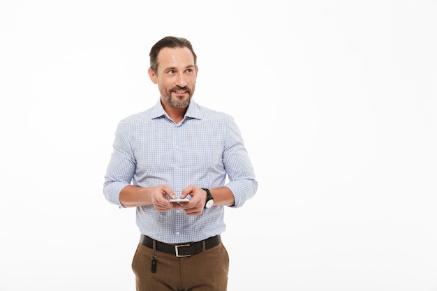 Portrait of a happy mature man dressed in shirt