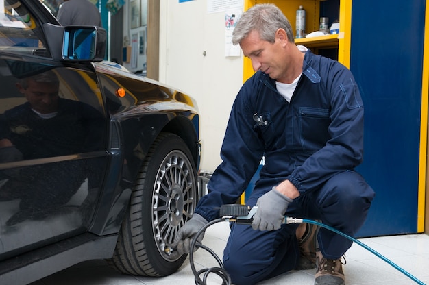 Portrait Of Happy Mature Mechanic