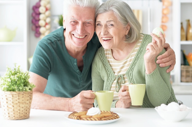 Portrait of a happy senior couple drinking tea